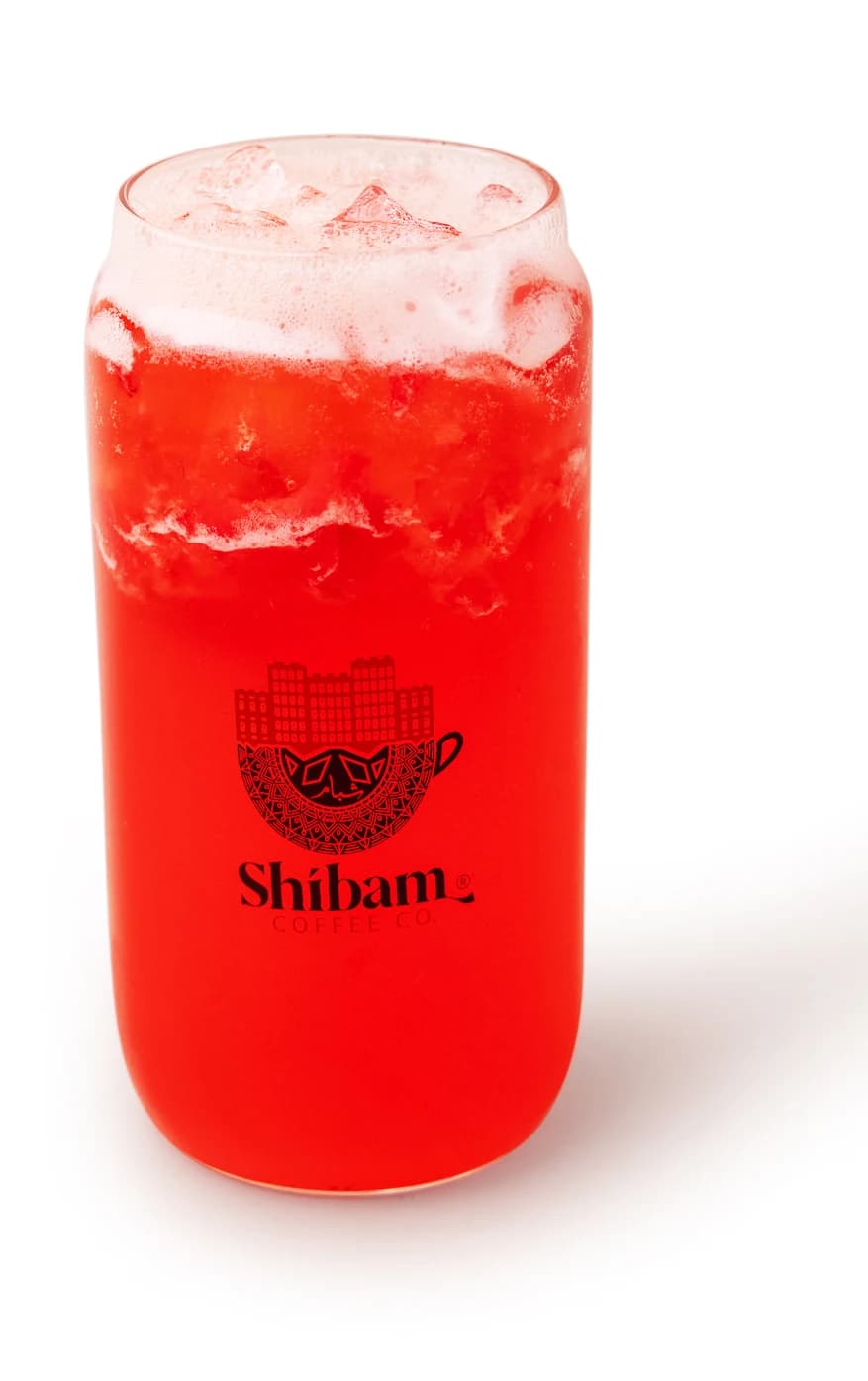 Strawberry Acai refresher in a Shibam Coffee glass