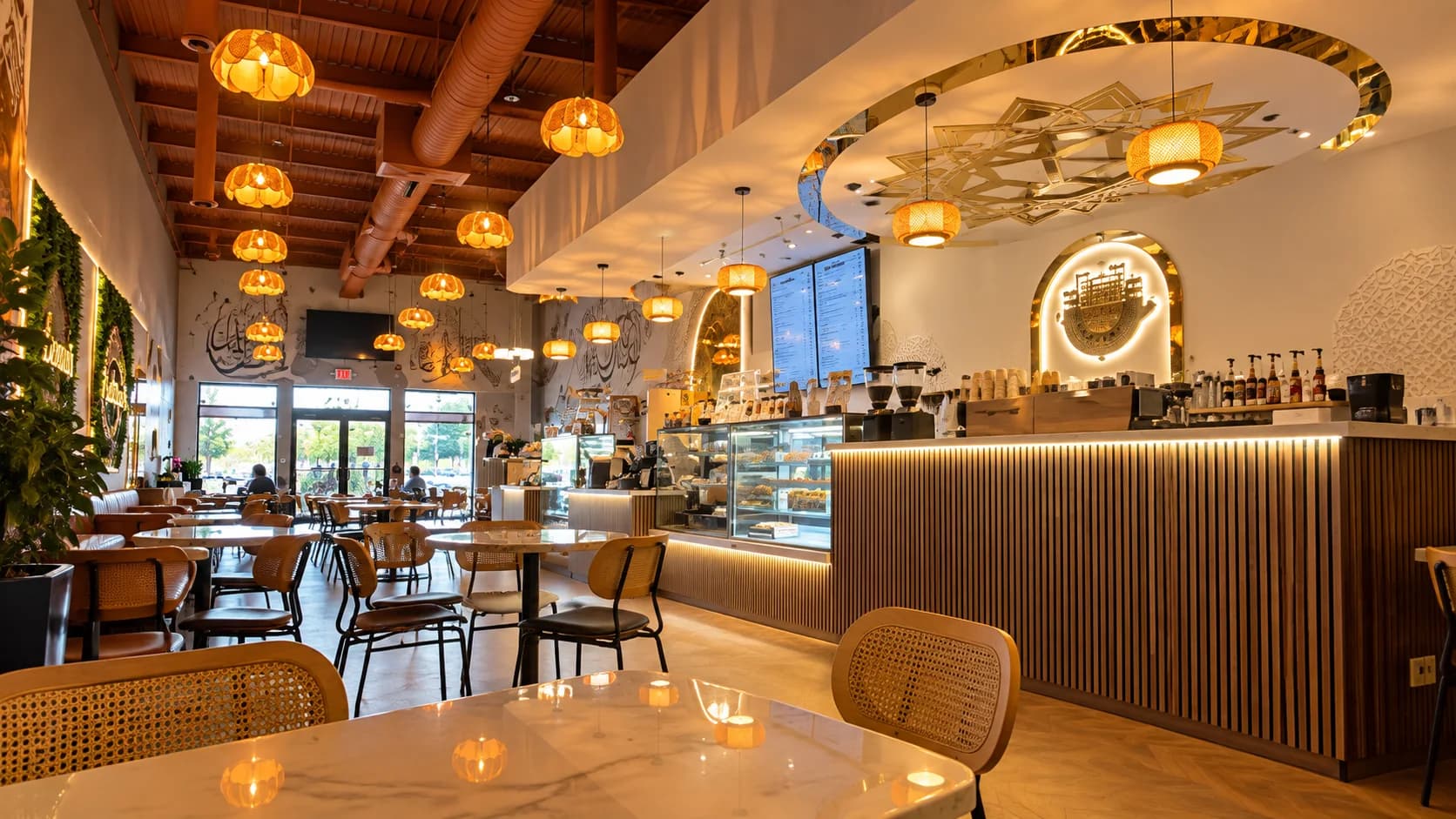 Morgantown Shibam Coffee café interior with counter, seating, and illuminated lanterns